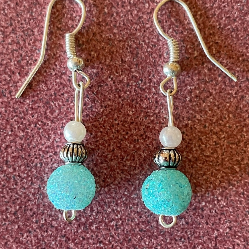 Turquoise colored earrings